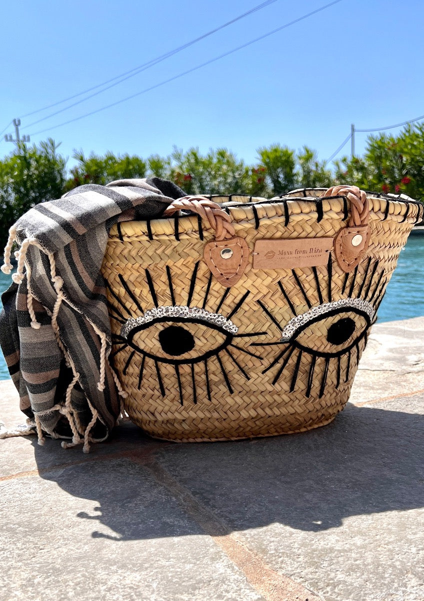 cesta artesanal de palma de ojos by Muxu from Ibiza
