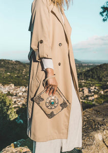 bolso de mano tipo clutch de piel artesanal
